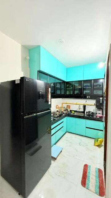 Kitchen in 2 BHK Apartment at Gandevi Road – for Sale