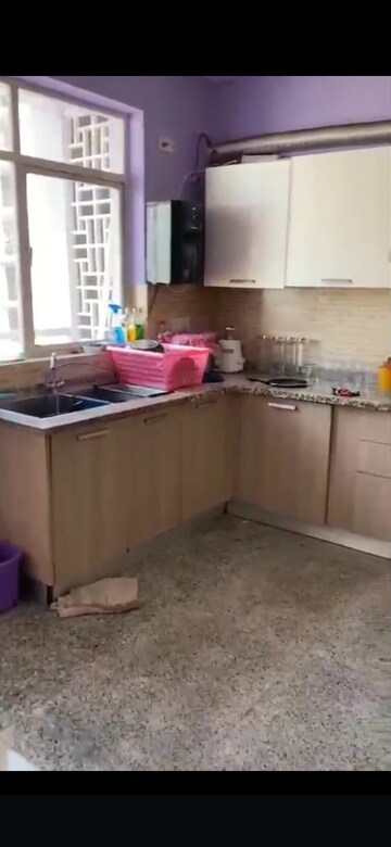 Kitchen in 2 BHK Apartment at Raheja Vedaanta, Sector 108 – for Rent