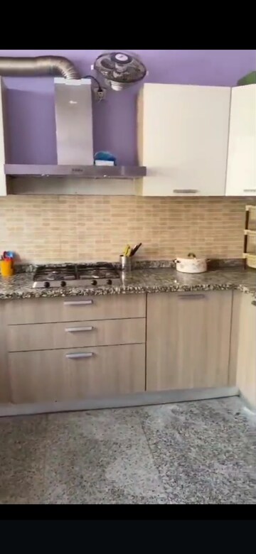 Kitchen in 2 BHK Apartment at Raheja Vedaanta, Sector 108 – for Rent