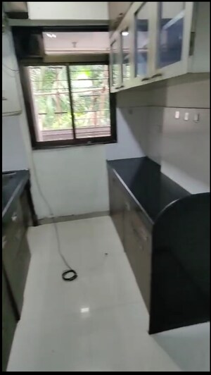 Kitchen in 2 BHK Apartment at Ram Pushpanjali Residency, Owale – for Sale