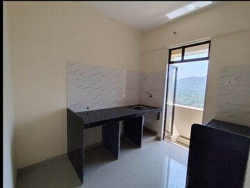 Master Bedroom in 2 BHK Apartment at Ram Pushpanjali Residency, Owale – for Sale