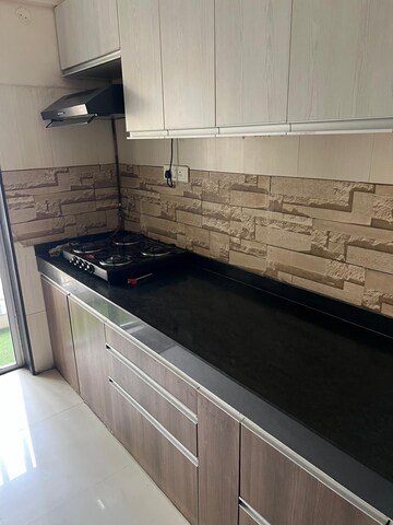 Kitchen in 2 BHK Apartment at Lodha Aqua, Mira Road – for Rent