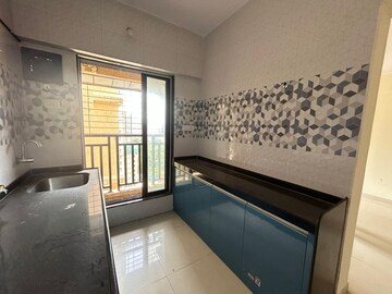 Kitchen in 2 BHK Apartment at Vasant Leela Apartment, Ghodbunder Road – for Rent