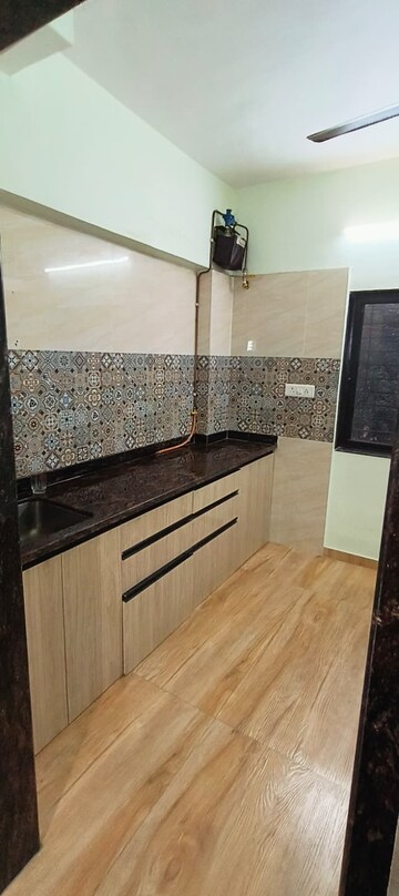 Kitchen in 1 BHK Apartment at Malhar Lokpuram CHS, Vasant Vihar – for Rent
