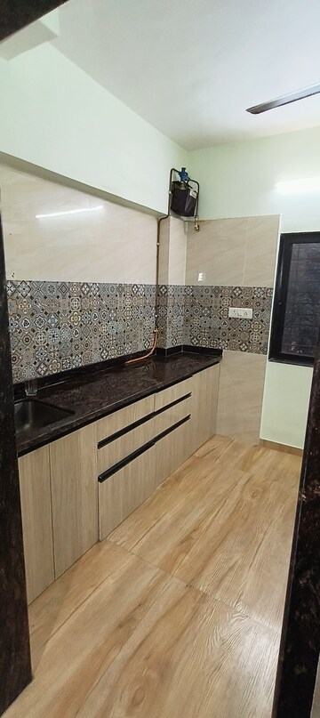 Kitchen in 1 BHK Apartment at Malhar Lokpuram CHS, Vasant Vihar – for Rent