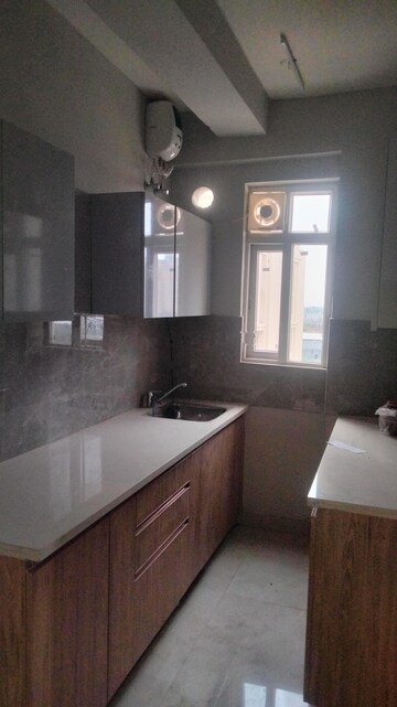 Kitchen in 3 BHK Apartment at Ramprastha Primera, Sector 37d – for Rent