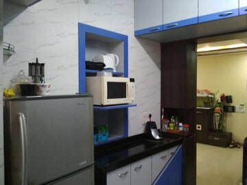 Kitchen in 3 BHK Apartment at Soham Garden, Manpada – for Rent