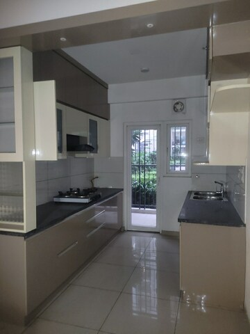 Kitchen in 3 BHK Apartment at Gulshan Botnia, Sector 144 – for Rent