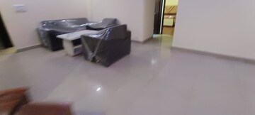 Living Room in 2.5 BHK Apartment at Aims Golf City, Sector 75 – for Sale