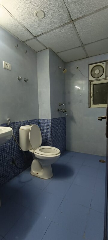 Bathroom in 2.5 BHK Apartment at Aims Golf City, Sector 75 – for Sale