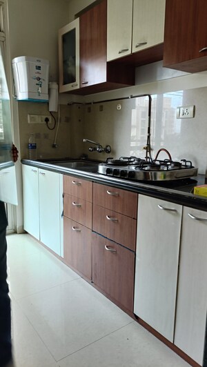 Kitchen in 1 BHK Apartment at Hiranandani Estate Crown, Ghodbunder Road – for Rent