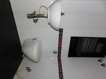 Bathroom in 2 BHK Apartment at Shiv Sagar Nilkanth CHS, Dadar West – for Rent