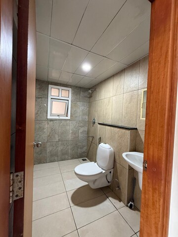 Bathroom in 1 BHK Apartment at Prestige Song Of The South, Yelenahalli – for Rent