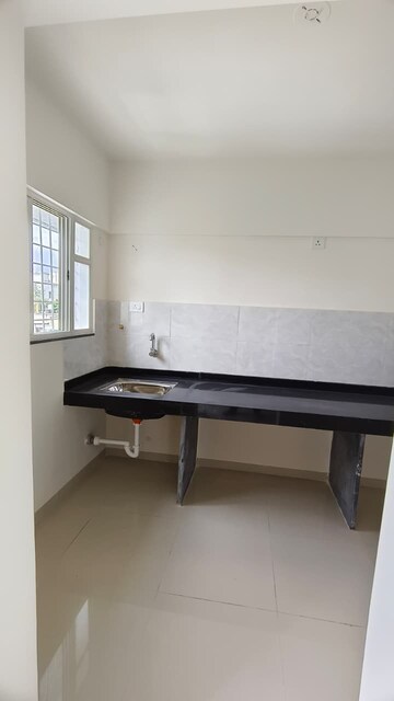 Kitchen in 2 BHK Apartment at Wadgaon Sheri – for Rent