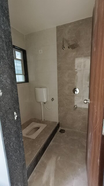 Bathroom in 2 BHK Apartment at Wadgaon Sheri – for Rent