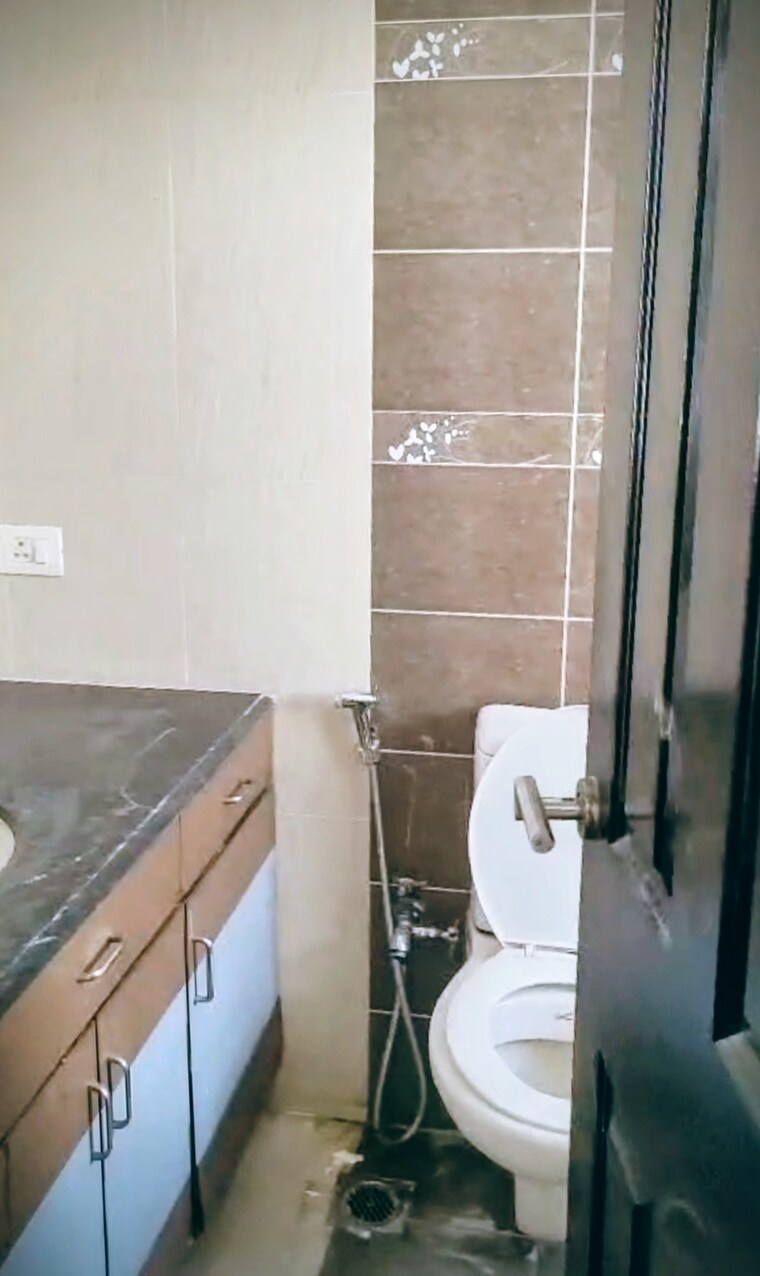 Bathroom, coral-apartments 3 Bedroom 1650 Sq.Ft. Apartment In Ramprastha Greens Ghaziabad 9198524
