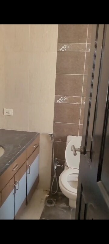 Bathroom in 3 BHK Apartment at Coral Apartments, Ramprastha Greens – for Rent