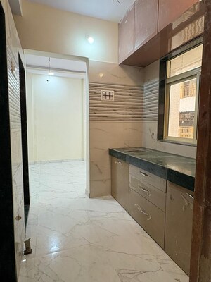Kitchen in 1 BHK Apartment at MJV Vaishnavi Arcade, Virar East – for Sale