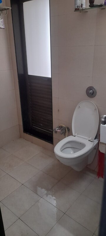 Bathroom in 2 BHK Apartment at Shree Satya Shankar Residency, Manpada – for Rent