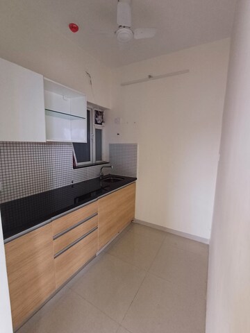 Kitchen in 2 BHK Apartment at Omkar Signet, Malad East – for Rent