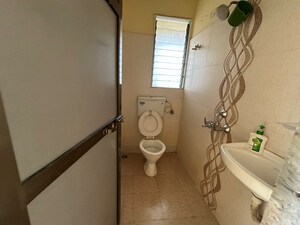Bathroom in 2 BHK Apartment at Vihang Hills, Ghodbunder Road – for Sale