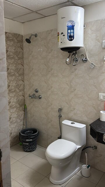 Bathroom in 3 BHK Apartment at Mahagun Mywoods, Sector 16c Greater Noida – for Rent