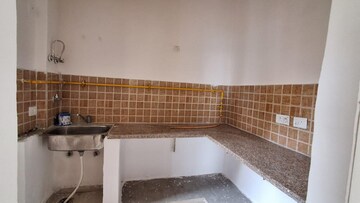 Kitchen in 3 BHK Apartment at Mahagun Mywoods, Sector 16c Greater Noida – for Rent