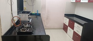 Kitchen in 1 BHK Apartment at Hiranandani Estate Oyster, Ghodbunder Road – for Sale