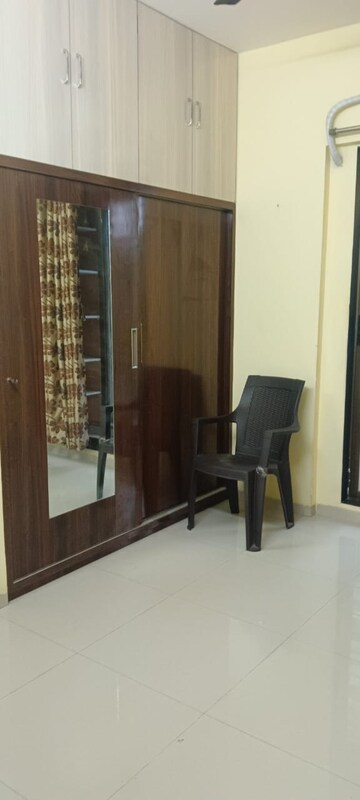 Living Room in 1 BHK Apartment at Hiranandani Estate Oyster, Ghodbunder Road – for Sale