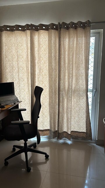 Living Room in 2.5 BHK Apartment at VVIP Homes, Gaur City 2 – for Rent