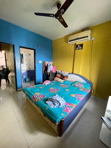 Bedroom in 2 BHK Apartment at Cozy Homes, Dhanori – for Rent