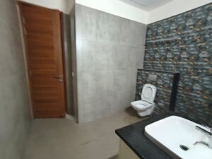 Bathroom in 4 BHK Apartment at Uchdpl Veridia Oakwood Enclave, Wave City – for Sale