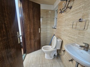 Bathroom in 3 BHK Builder Floor at BPTP Parkland, Sector 75 – for Sale