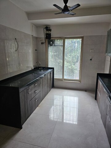 Kitchen in 4 BHK Apartment at Mahesh Jai Arati, Chembur – for Rent