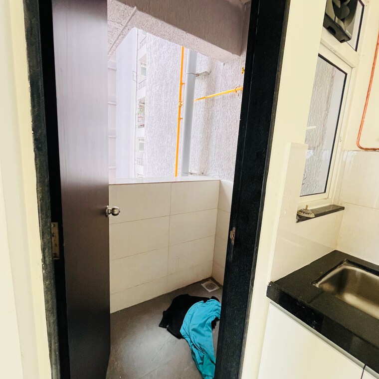 Kitchen, kolte-patil-r1-life-republic 2 Bedroom 700 Sq.Ft. Apartment In Marunji Pune 9199361