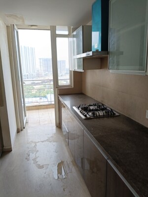 Kitchen in 3 BHK Apartment at Puri Diplomatic Greens Phase I, Sector 111 – for Sale