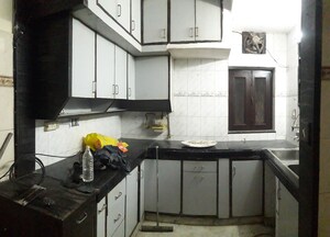 Kitchen in 2 BHK Apartment at Printers Apartments, Rohini Sector 13 – for Sale
