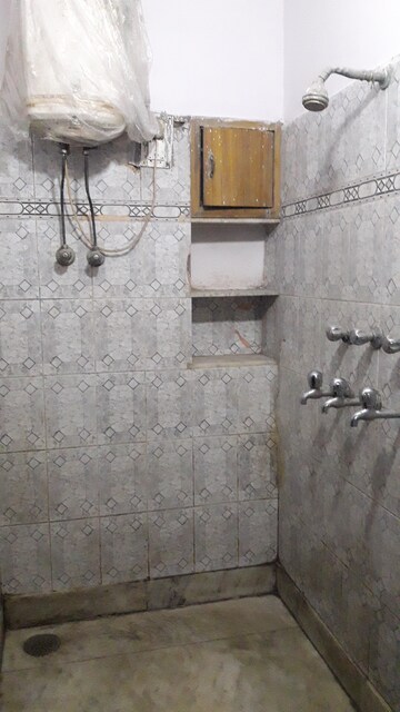 Bathroom in 2 BHK Apartment at Printers Apartments, Rohini Sector 13 – for Sale