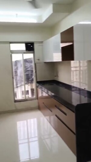 Kitchen in 2 BHK Apartment at Bini Winspace Amelio, Andheri West – for Rent