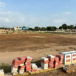 Plot For Sale in Unique City NRI Villas