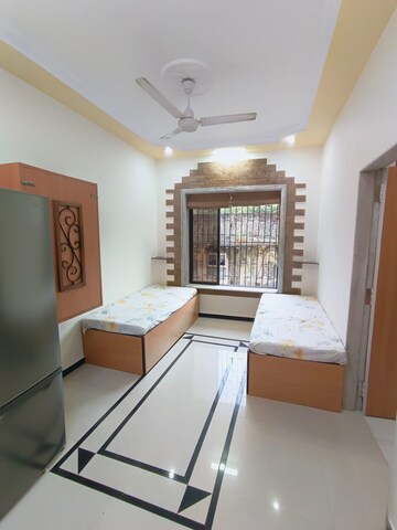 Living Room in 1 BHK Apartment at Colaba – for Rent