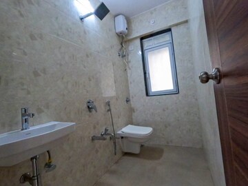 Bathroom in 1 BHK Apartment at RK Cosmos CHS, Thane West – for Sale