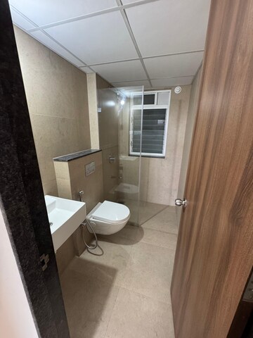 Bathroom in 2 BHK Apartment at Runwal The Central Park, Chinchwad – for Rent