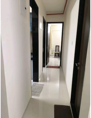 Building Lobby in 2 BHK Apartment at Sheth Vasant Athena, Laxmi Nagar – for Sale