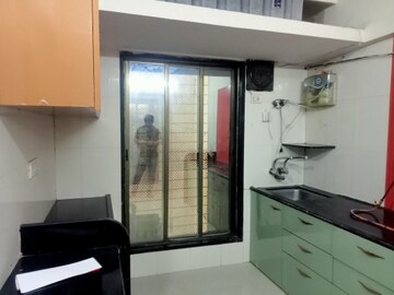Kitchen in 2 BHK Apartment at Swarna Apartments, Mira Road – for Rent