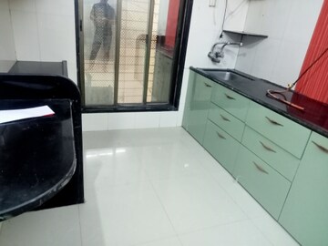 Kitchen in 2 BHK Apartment at Swarna Apartments, Mira Road – for Rent