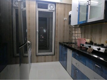 Kitchen in 2 BHK Apartment at Runwal Garden City, Balkum Pada – for Rent