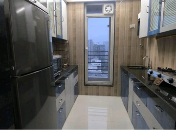 Kitchen in 2 BHK Apartment at Runwal Garden City, Balkum Pada – for Rent