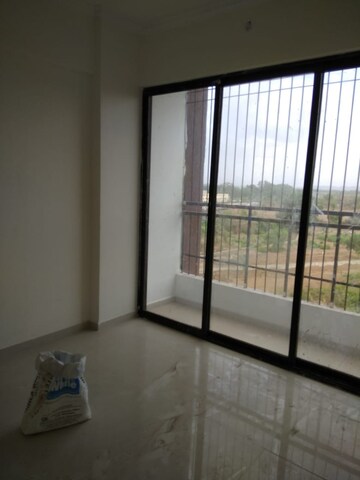 Room in 1 BHK Apartment at Raj Tulsi Aastha, Badlapur East – for Sale