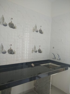 Kitchen in 1 BHK Apartment at Raj Tulsi Aastha, Badlapur East – for Sale